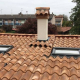 Finestre Velux già posate su tetto in tegole a Palazzolo Milanese, vista esterna dell'intervento completato